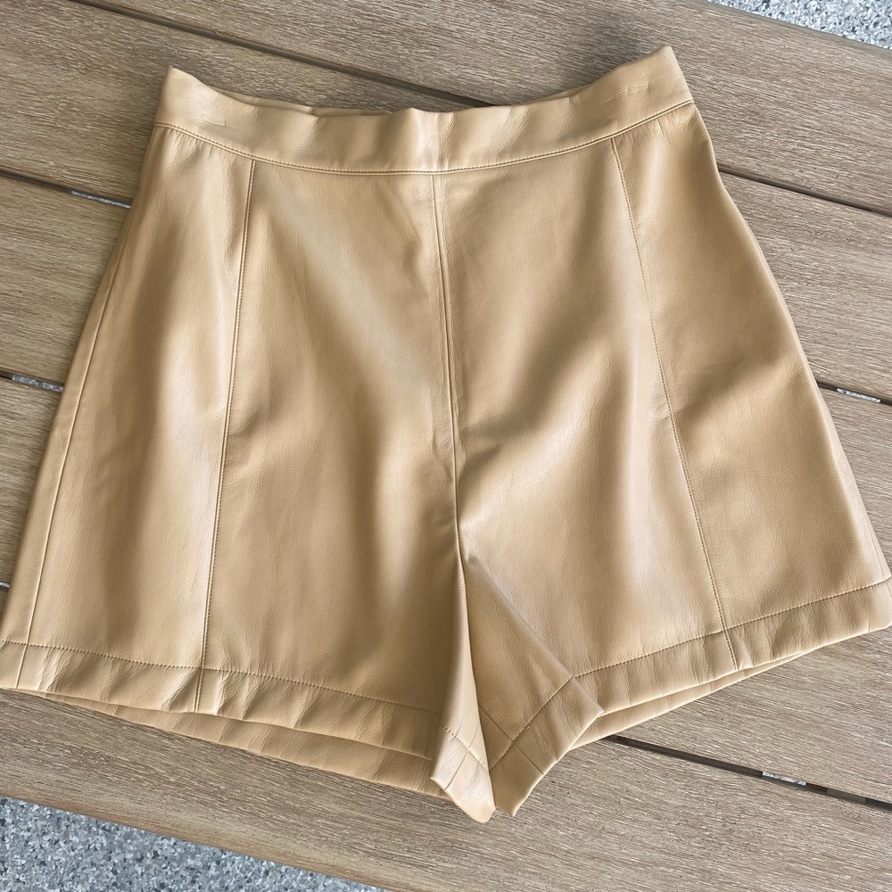 Brand new, never worn Emily McCarthy tan leather shorts